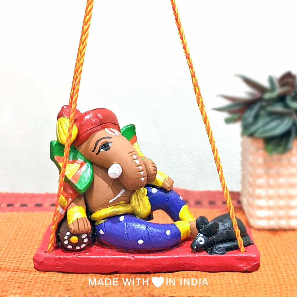 Vishvamukha — Handpainted Terracotta Ganesha Statue on a Swing - Made with Love in India