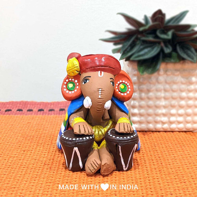 Nadaprati — Handpainted Terracotta Ganesha Statue Playing Tabla - Made with Love in India