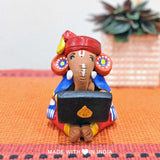 Siddhi Data — Handpainted Terracotta Ganesha Statue With a Laptop